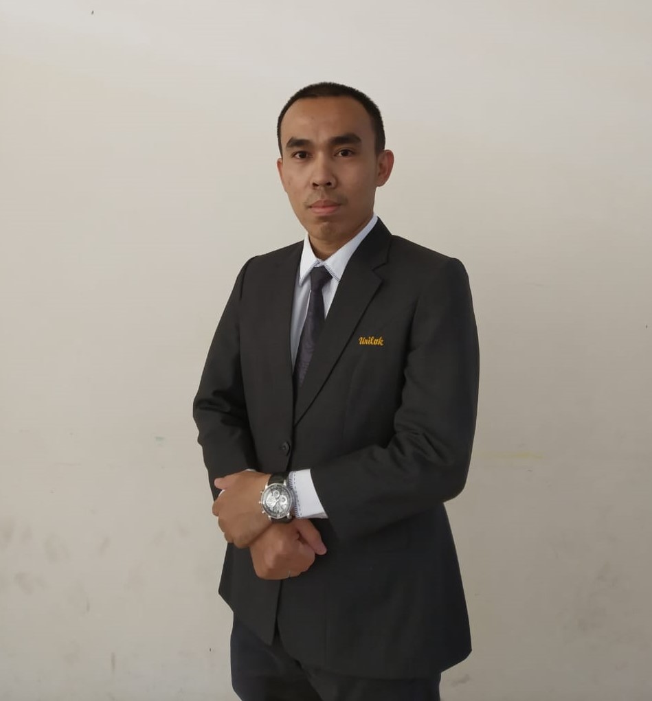 Dr. Robert Libra, S.H., M.H